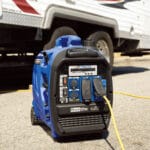Compact inverter generator displayed with clean, quiet power branding