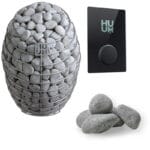 Unboxing display of HUUM Drop sauna heater and included components