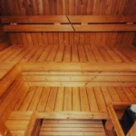 cube sauna next to hot tub