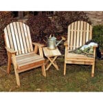 Detail shot of fanback and hardware on Red Cedar Fanback Patio Chair, highlighting zinc-encased steel and smooth profiles in durable outdoor patio chair construction.