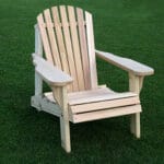 Back view of Cedar American Forest Adirondack Chair, illustrating supportive backrest and stable legs for long-lasting unfinished wood furniture in scenic spots.