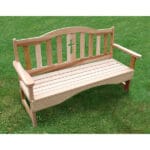 Close-up of holy cross detail on Cedar Garden Bench backrest, emphasizing sustainable Western Red Cedar material and smooth finish in this inspirational solid wood furniture piece