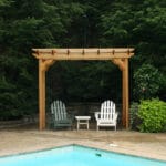 Front view of Cedar New Dawn Pergola (3x8 ft), a wood pergola from Western Red Cedar with arched beams and sturdy posts for shaded garden retreats.