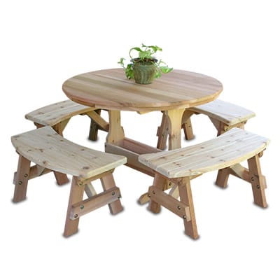 Front view of Cedar Round Trestle Dining Set, a round wood dining table from Western Red Cedar with trestle base and three curved benches for space-saving meals.