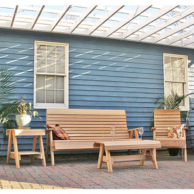 Side view of 6ft Cedar Bench from Twin Ponds Collection, emphasizing ergonomic seat and back for lasting patio seating.