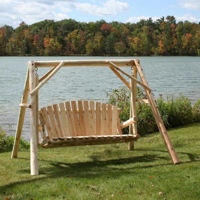 Cedar swing set placed in garden area
