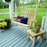 Rustic log end table on patio