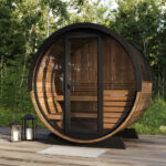 Roof drip edge rail directing water off the barrel sauna