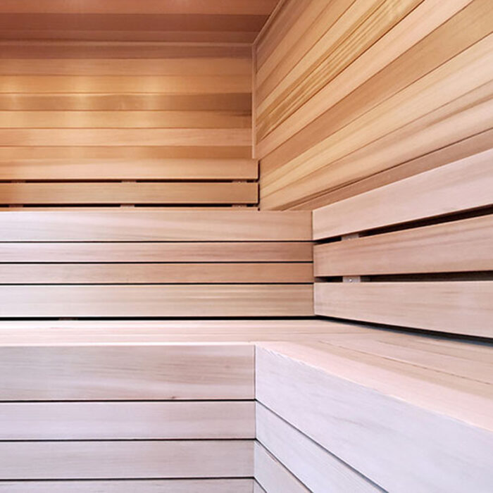 Close-up of cedar tongue and groove paneling for sauna walls