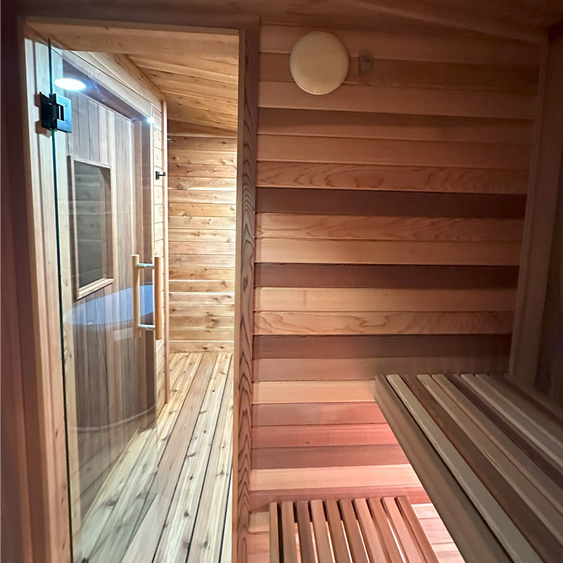 Cold Creek sauna interior with clear cedar tongue and groove finish