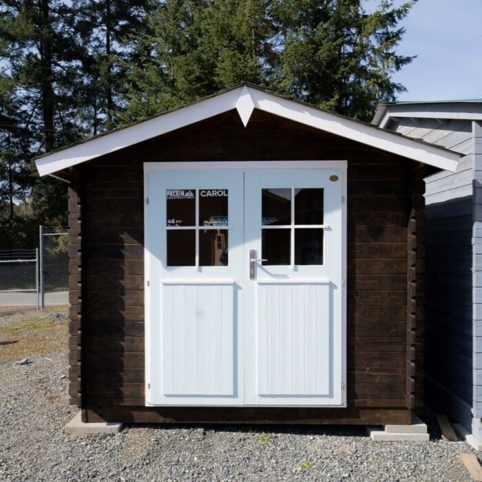 Compact wooden shed with finished exterior