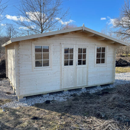 Blue painted room shed with white trim