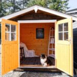 Black metal roof option for compact shed house
